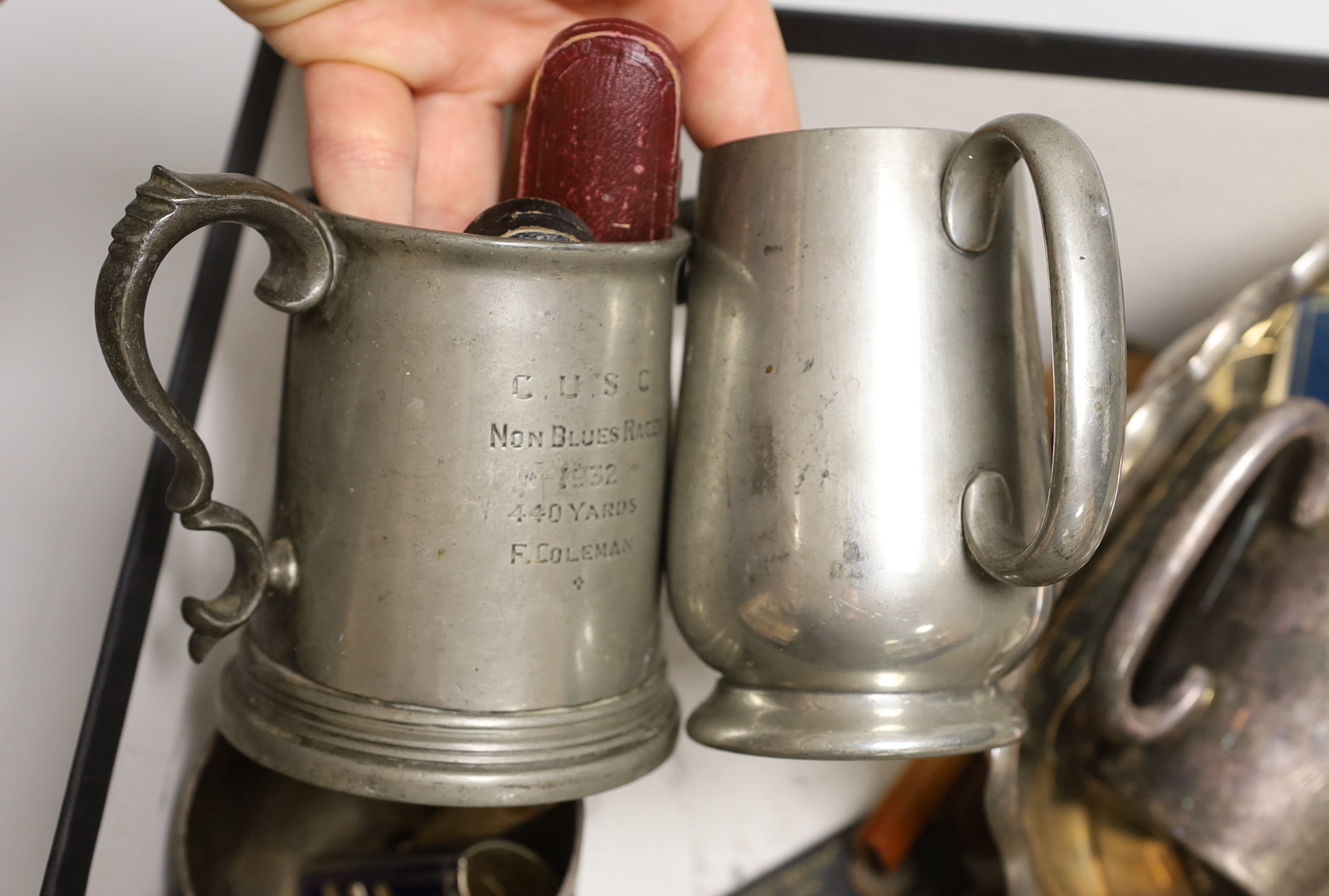A group of assorted smoker's accoutrements and plated mugs